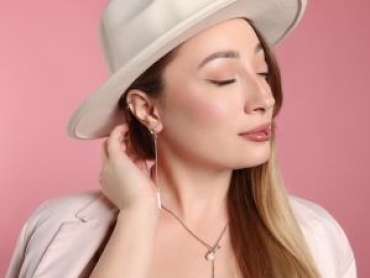 Young fashionable woman with lip and ear piercing.