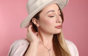 Young fashionable woman with lip and ear piercing.