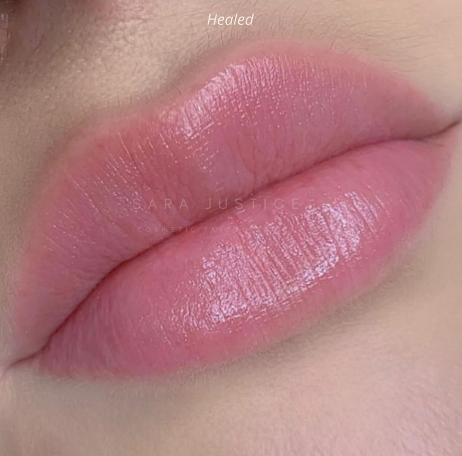 Close-up of healed lips with a soft pink lip blush finish, showing smooth texture and natural definition.